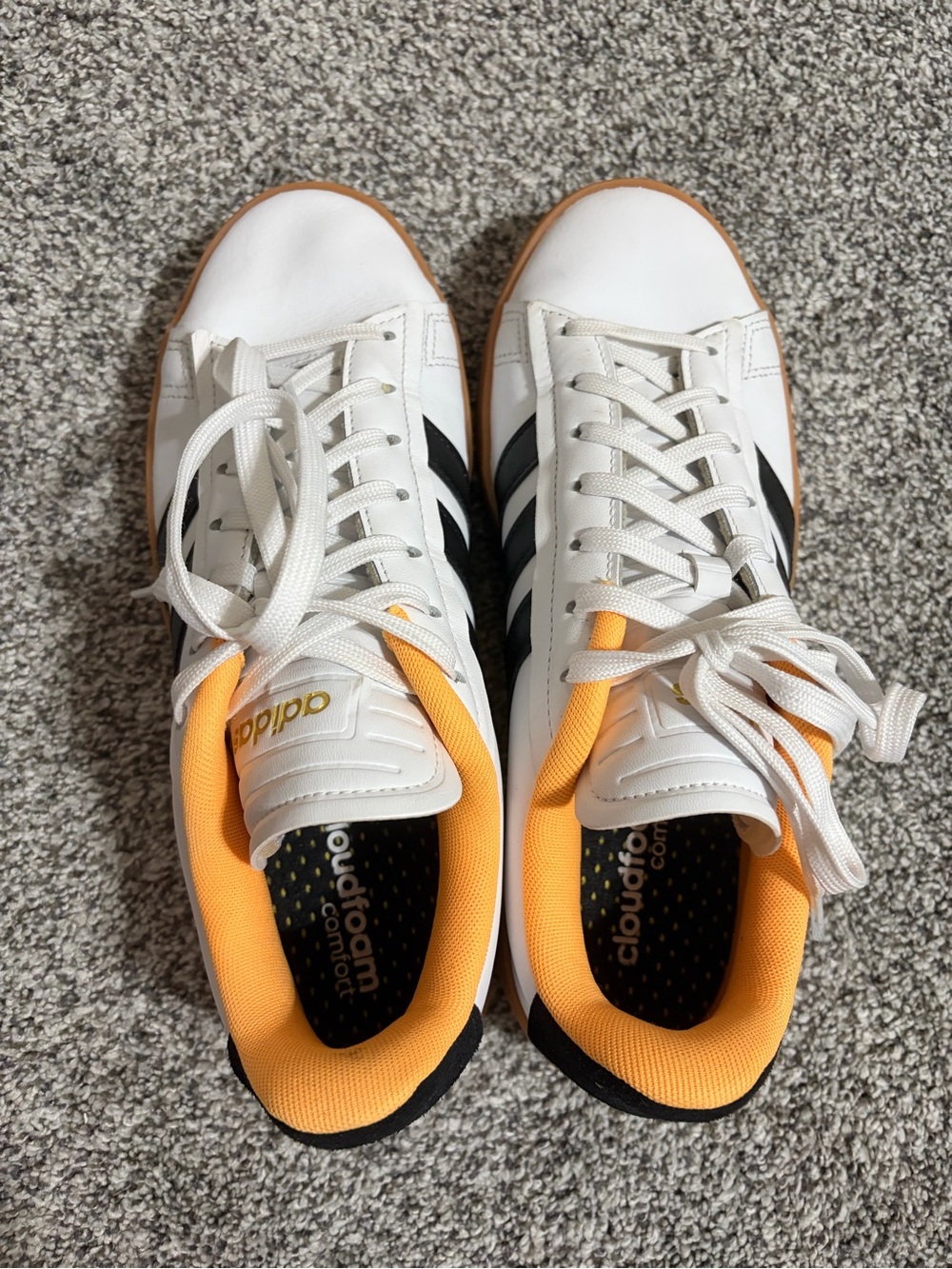 Adidas womens White Sneakers with Black Stripes and Orange Lining
